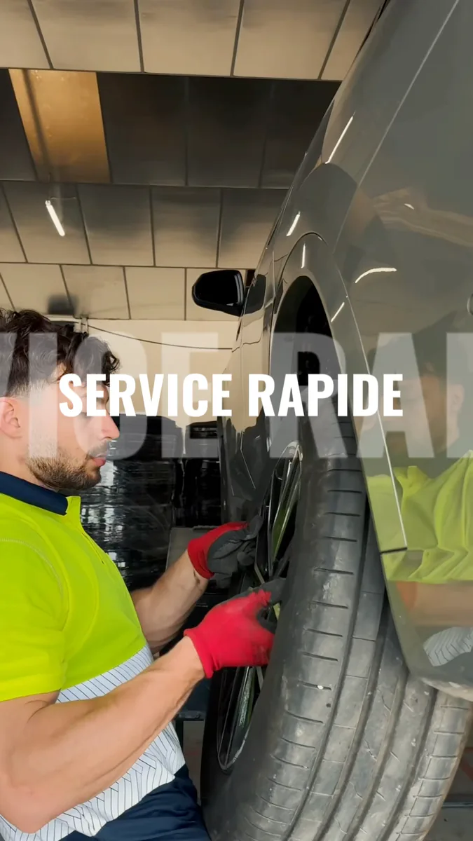 Audi berline en atelier pour remplacement de pneus au Cres
